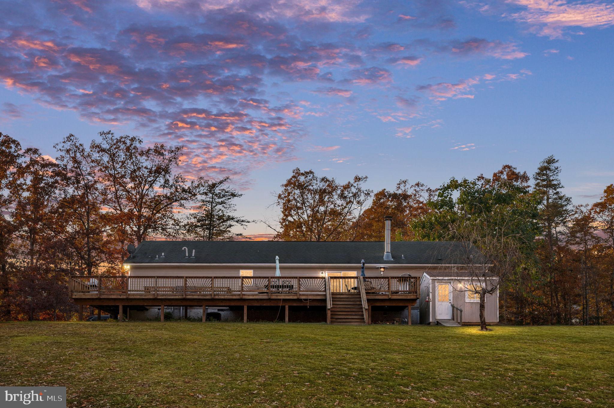 10325 Mill Pond Road Spotsylvania, VA 22551 - Photo 2 of 43 a view of a lake with houses