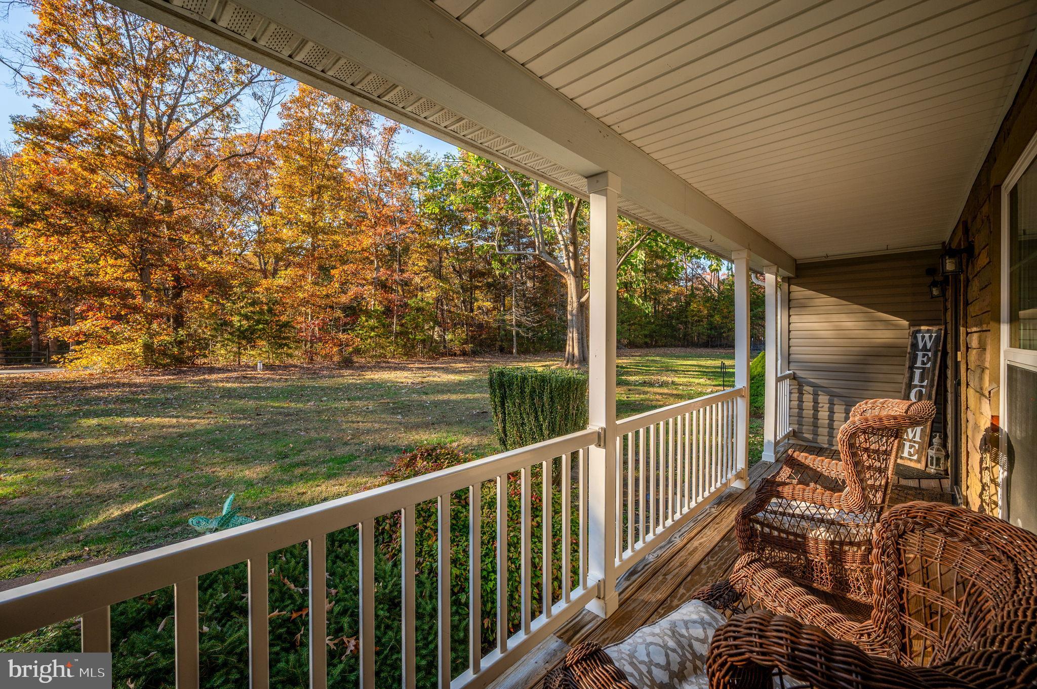 10325 Mill Pond Road Spotsylvania, VA 22551 - Photo 6 of 43 a view of a two chair in the balcony