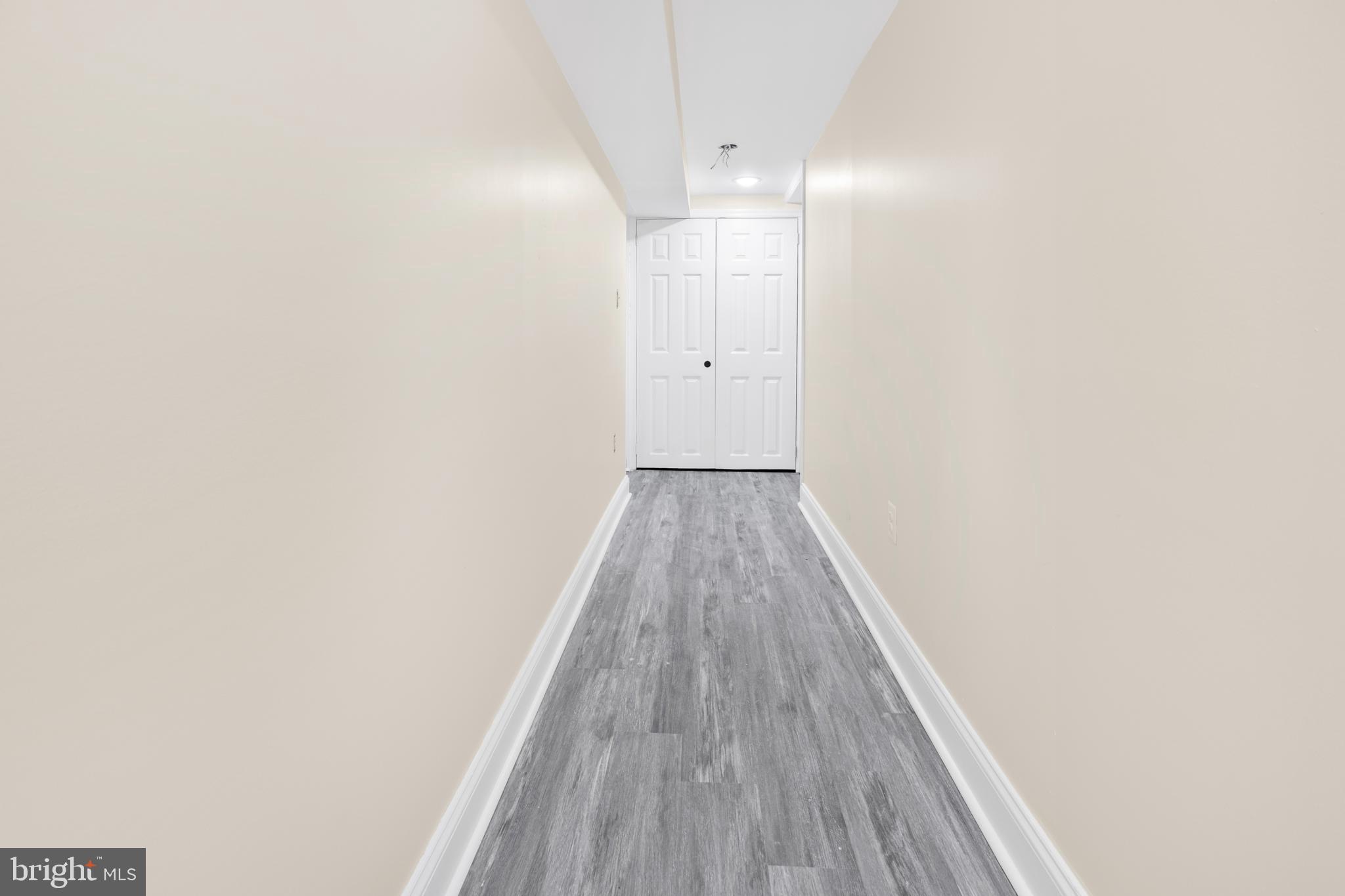 713 Marcy Avenue Oxon Hill, MD 20745 - Photo 15 of 24 a view of a room with wooden floor