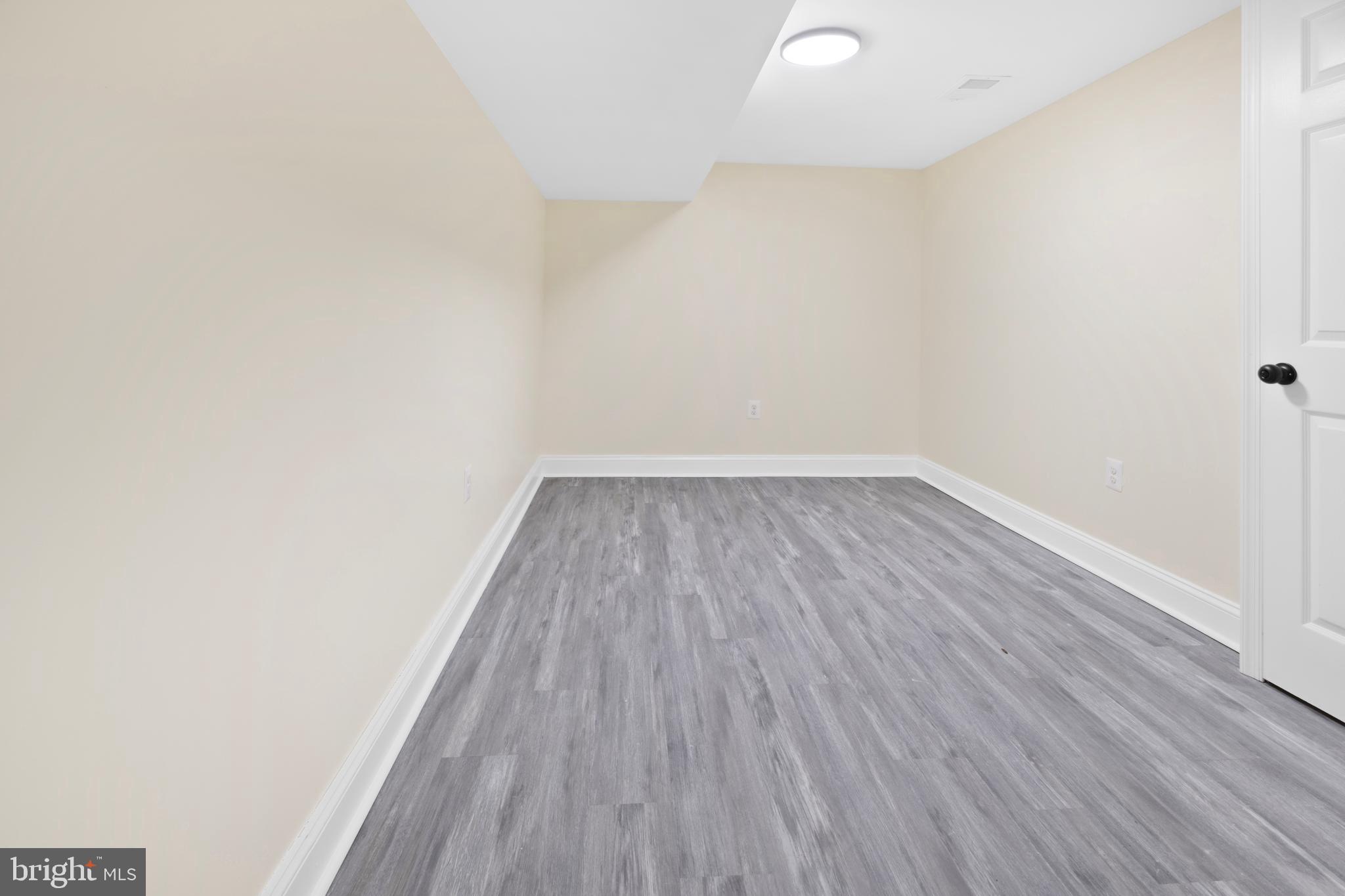 713 Marcy Avenue Oxon Hill, MD 20745 - Photo 24 of 24 a view of wooden floor in a room