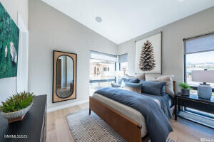 82 Caballada Street Reno, NV 89511 - Photo 20 of 39 a bedroom with furniture and a potted plant