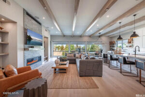 82 Caballada Street Reno, NV 89511 - Photo 2 of 39 a living room with furniture and a large window