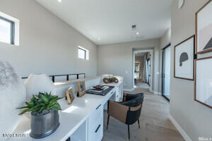 82 Caballada Street Reno, NV 89511 - Photo 23 of 39 a dining room with furniture and potted plant