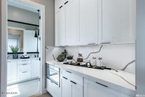 82 Caballada Street Reno, NV 89511 - Photo 25 of 39 a kitchen with a sink and cabinets