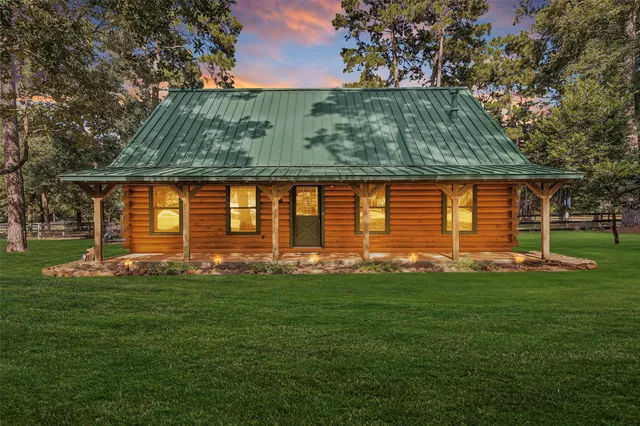 a view of a house with a big yard