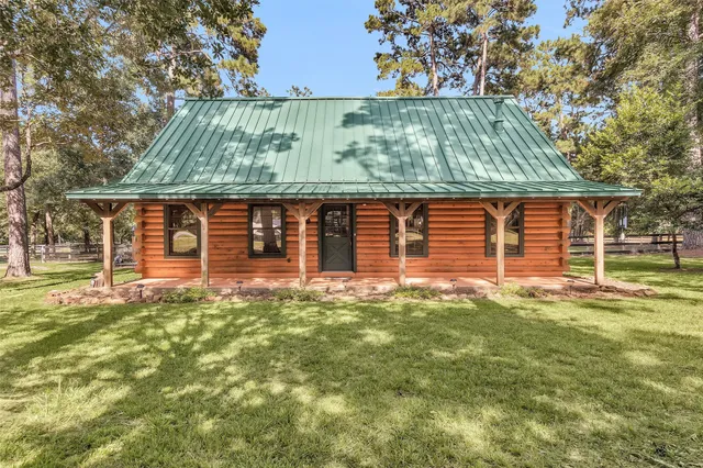 front view of a house with a large window