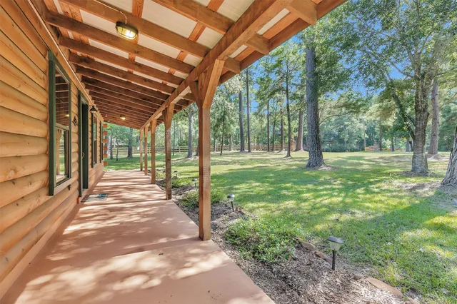 a view of a backyard with garden