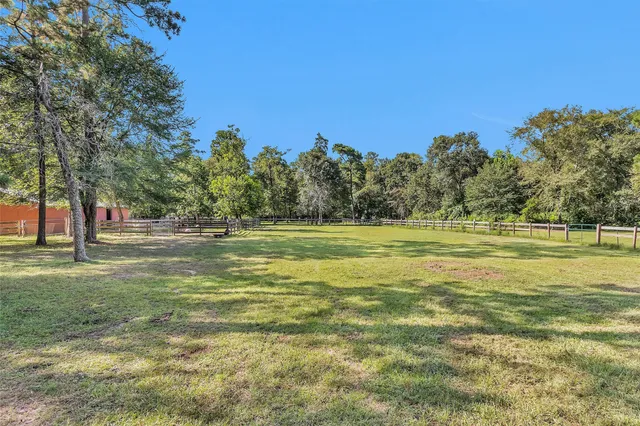 a view of a house with a big yard