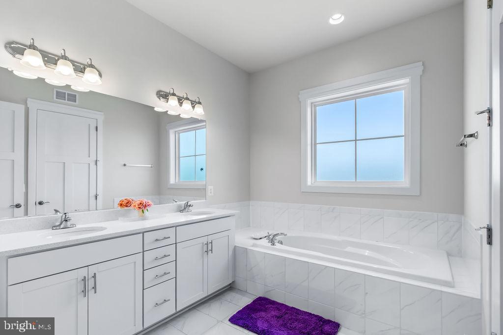 2806 Water Strider Way Odenton, MD 21113 - Photo 26 of 63 Light filled with oversized mirrors