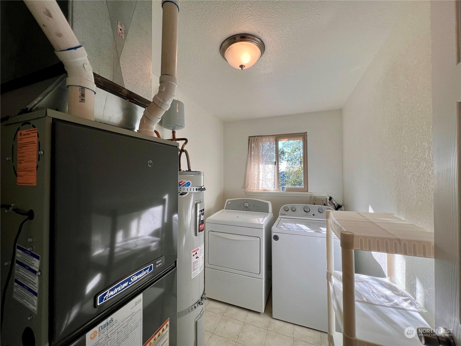 1951 Southeast Van Skiver Road Port Orchard, WA 98367 - Photo 18 of 30 a utility room with dryer and washer