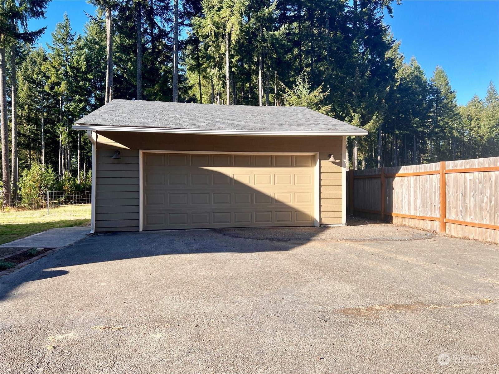 1951 Southeast Van Skiver Road Port Orchard, WA 98367 - Photo 29 of 30 a view of backyard and garage
