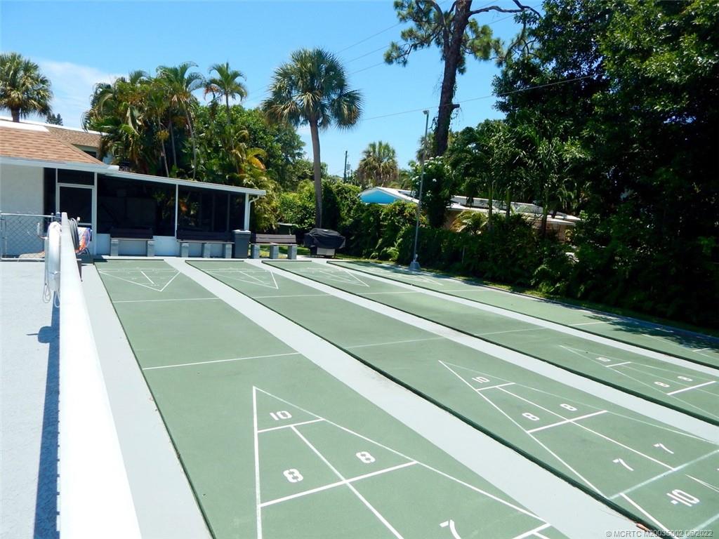 2950 Southeast Ocean Boulevard, Unit 74 Stuart, FL 34996 - Photo 39 of 39 a view of a tennis court