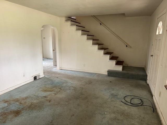 225 Old Leechburg Road Pittsburgh, PA 15239 - Photo 3 of 10 a view of a room with stairs and white walls