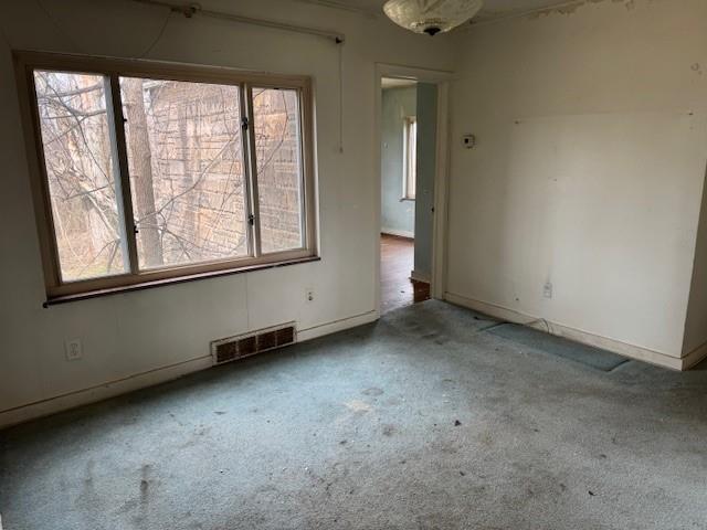 225 Old Leechburg Road Pittsburgh, PA 15239 - Photo 4 of 10 an empty room with a window