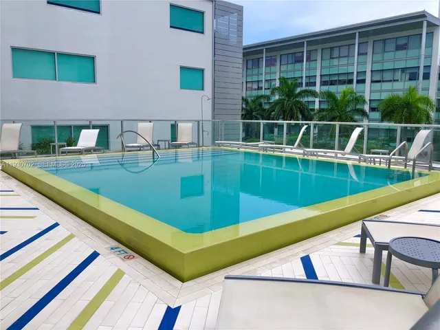 a view of a house with a swimming pool