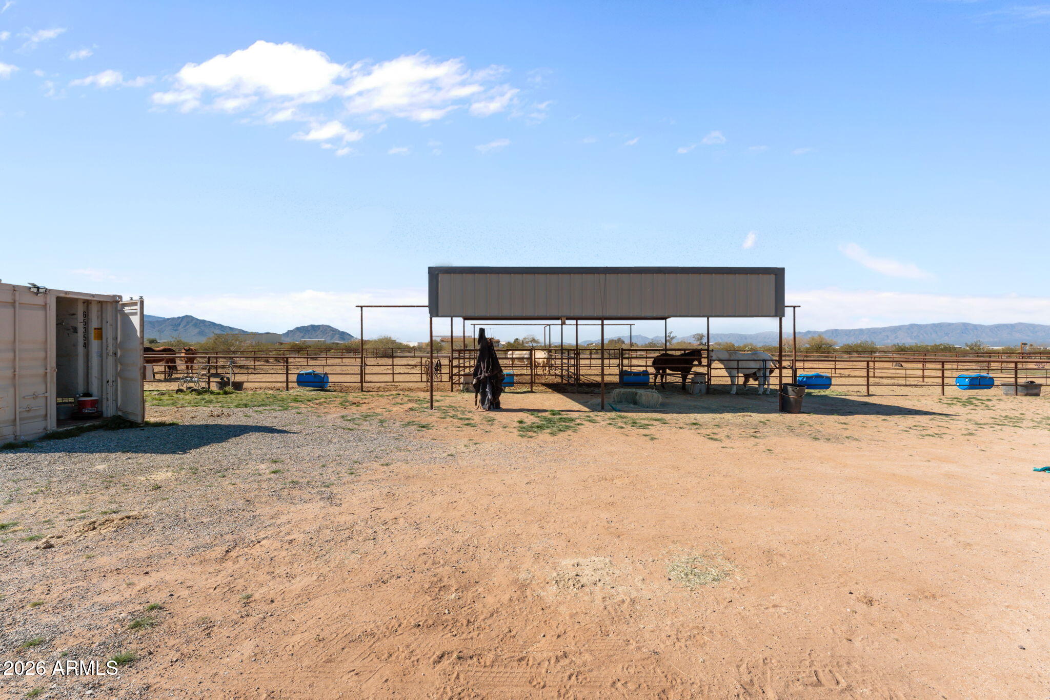 51539 West Donald Road Aguila, AZ 85320 - Photo 13 of 43 a view of a swimming pool and an outdoor seating
