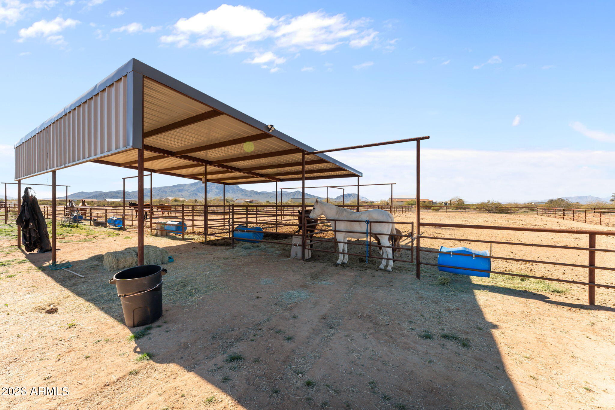 51539 West Donald Road Aguila, AZ 85320 - Photo 15 of 43 a view of a swimming pool with a lounge chair