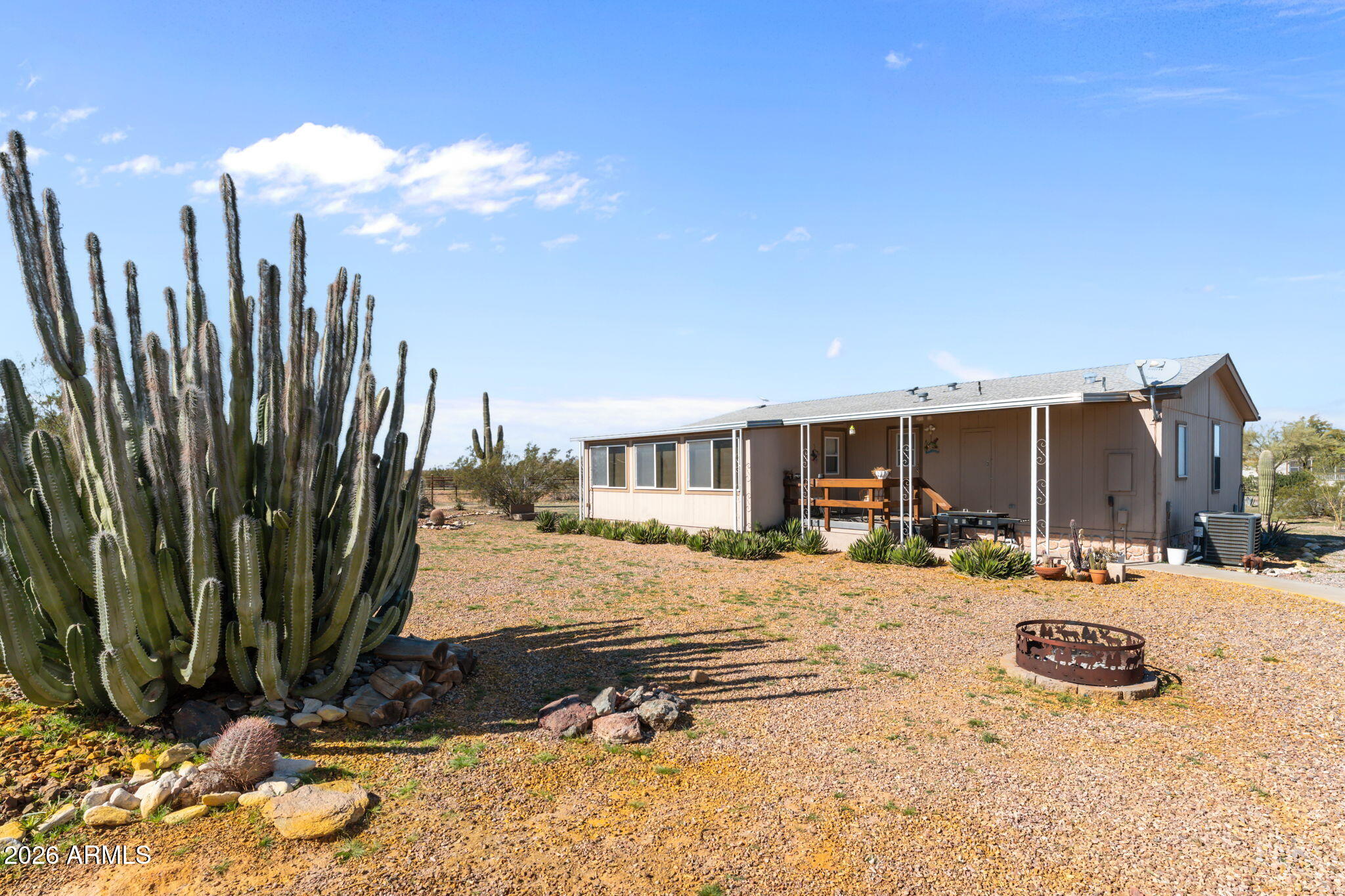 51539 West Donald Road Aguila, AZ 85320 - Photo 18 of 43 a view of a house with a yard covered in snow