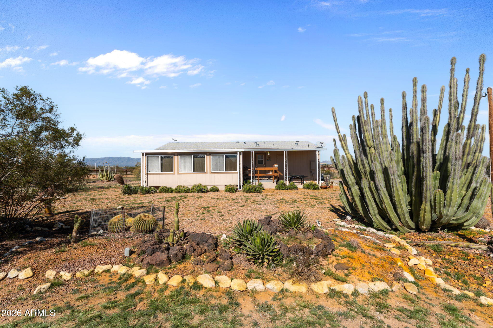 51539 West Donald Road Aguila, AZ 85320 - Photo 19 of 43 a view of a house with backyard and sitting area