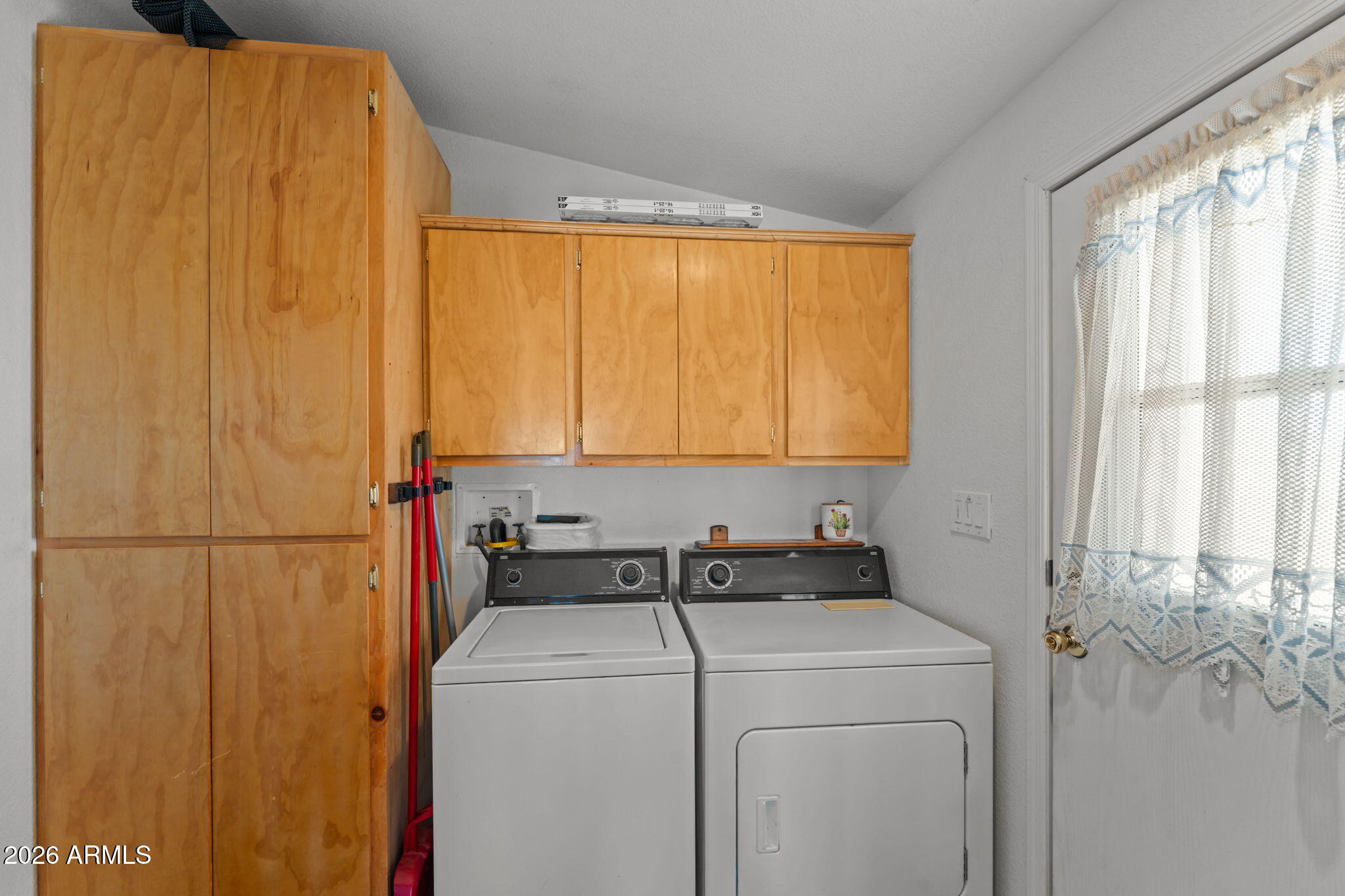 51539 West Donald Road Aguila, AZ 85320 - Photo 23 of 43 a utility room with dryer and washer