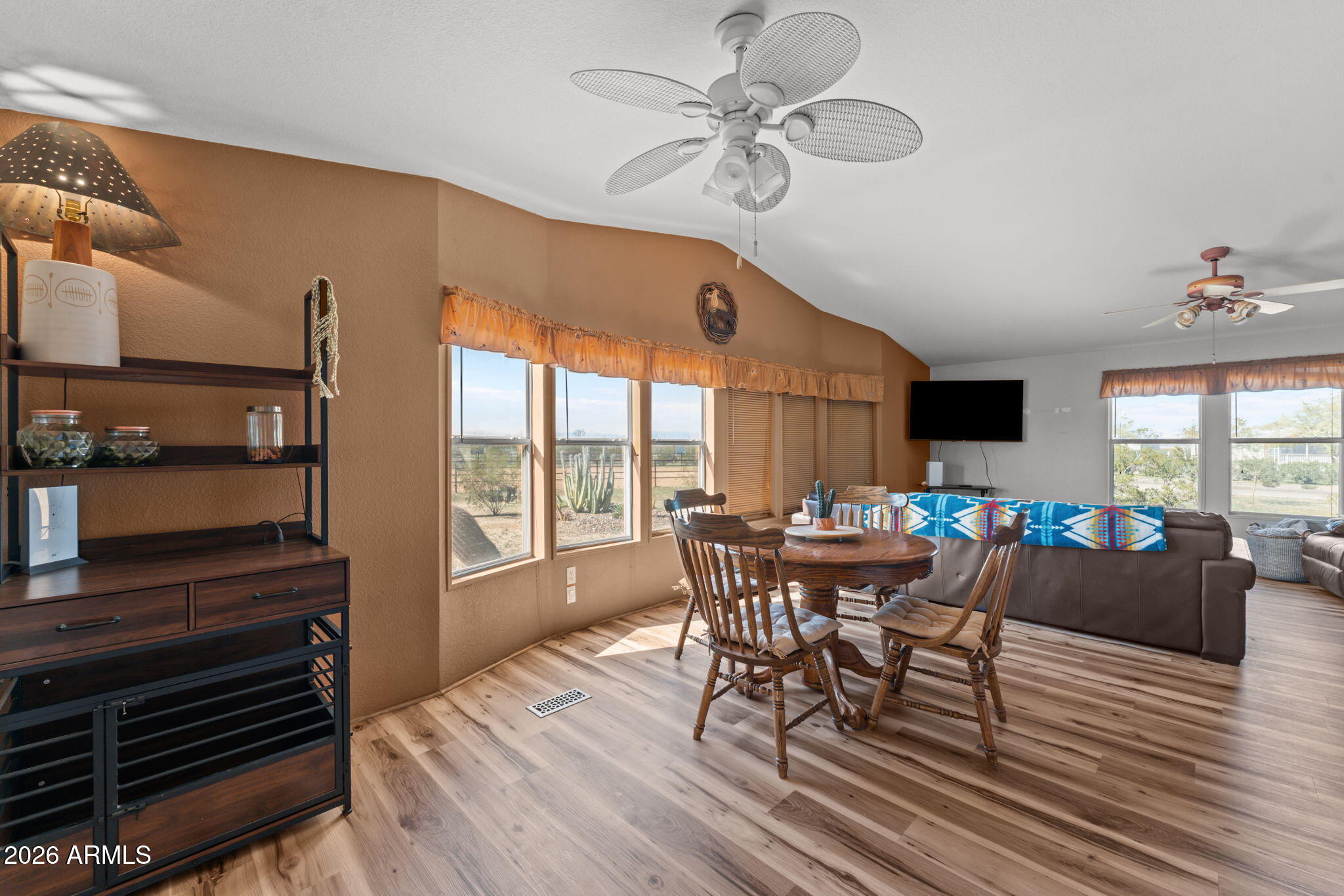 51539 West Donald Road Aguila, AZ 85320 - Photo 29 of 43 a view of a dining room with furniture window and outside view