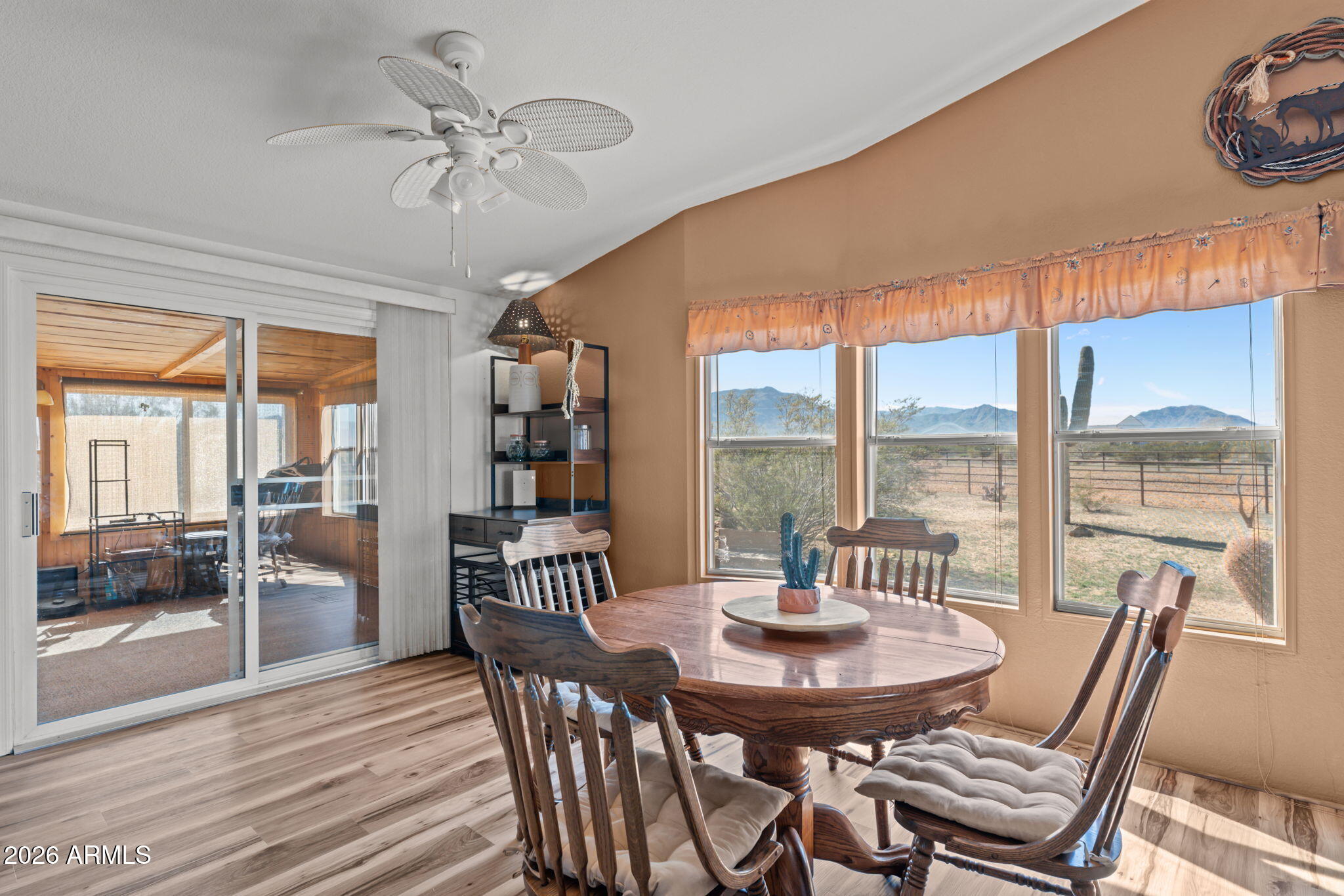 51539 West Donald Road Aguila, AZ 85320 - Photo 30 of 43 a view of a dining room with furniture window and outside view