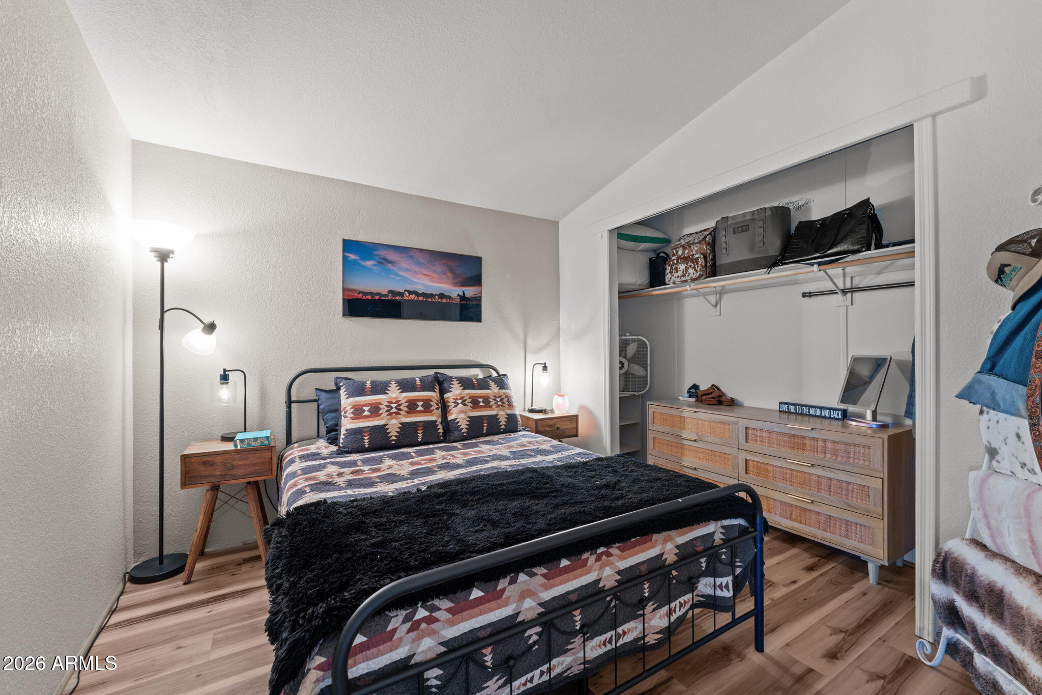 51539 West Donald Road Aguila, AZ 85320 - Photo 37 of 43 a bedroom with a bed and furniture