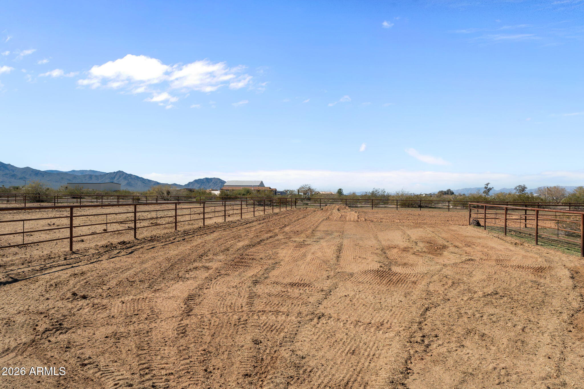 51539 West Donald Road Aguila, AZ 85320 - Photo 7 of 43 a view of a lake with mountain in the background