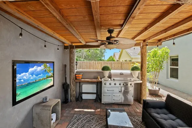 a room with furniture and flat screen tv