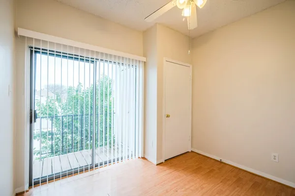 a view of a room with a large window