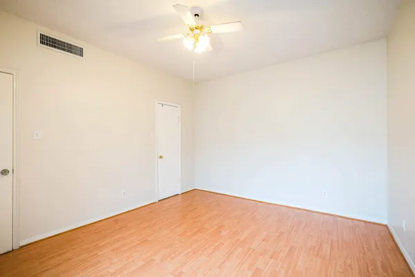 a view of a big room with carpet