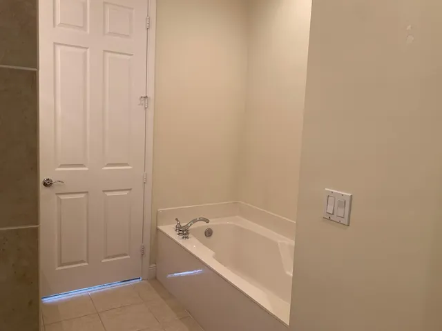 a bathroom with a bathtub