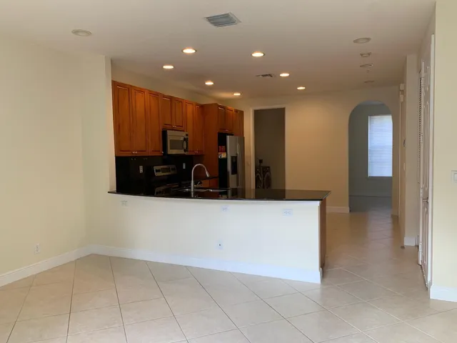 a view of a living room with furniture