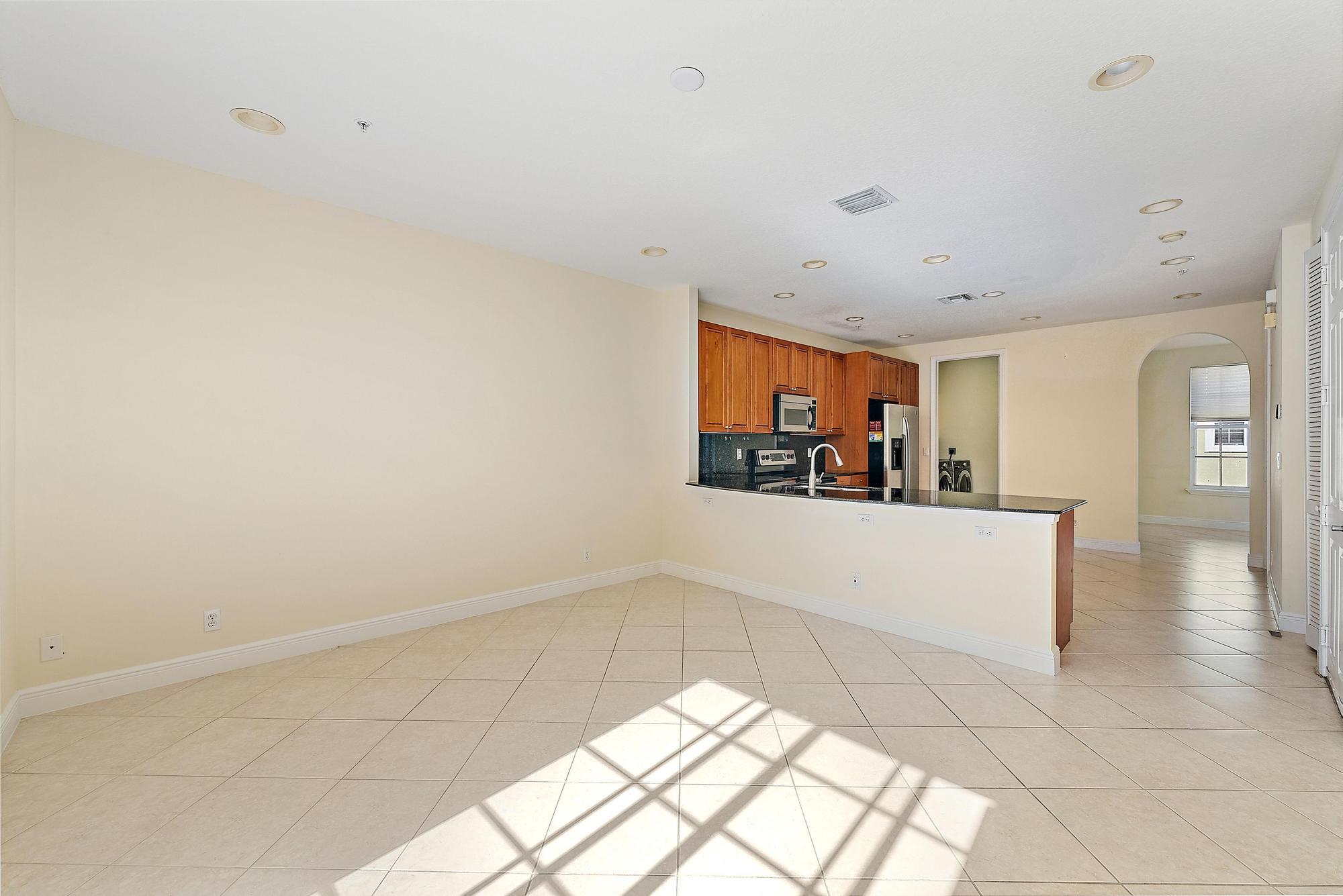 141 Morning Dew Circle Jupiter, FL 33458 - Photo 5 of 22 a view of kitchen with furniture and window