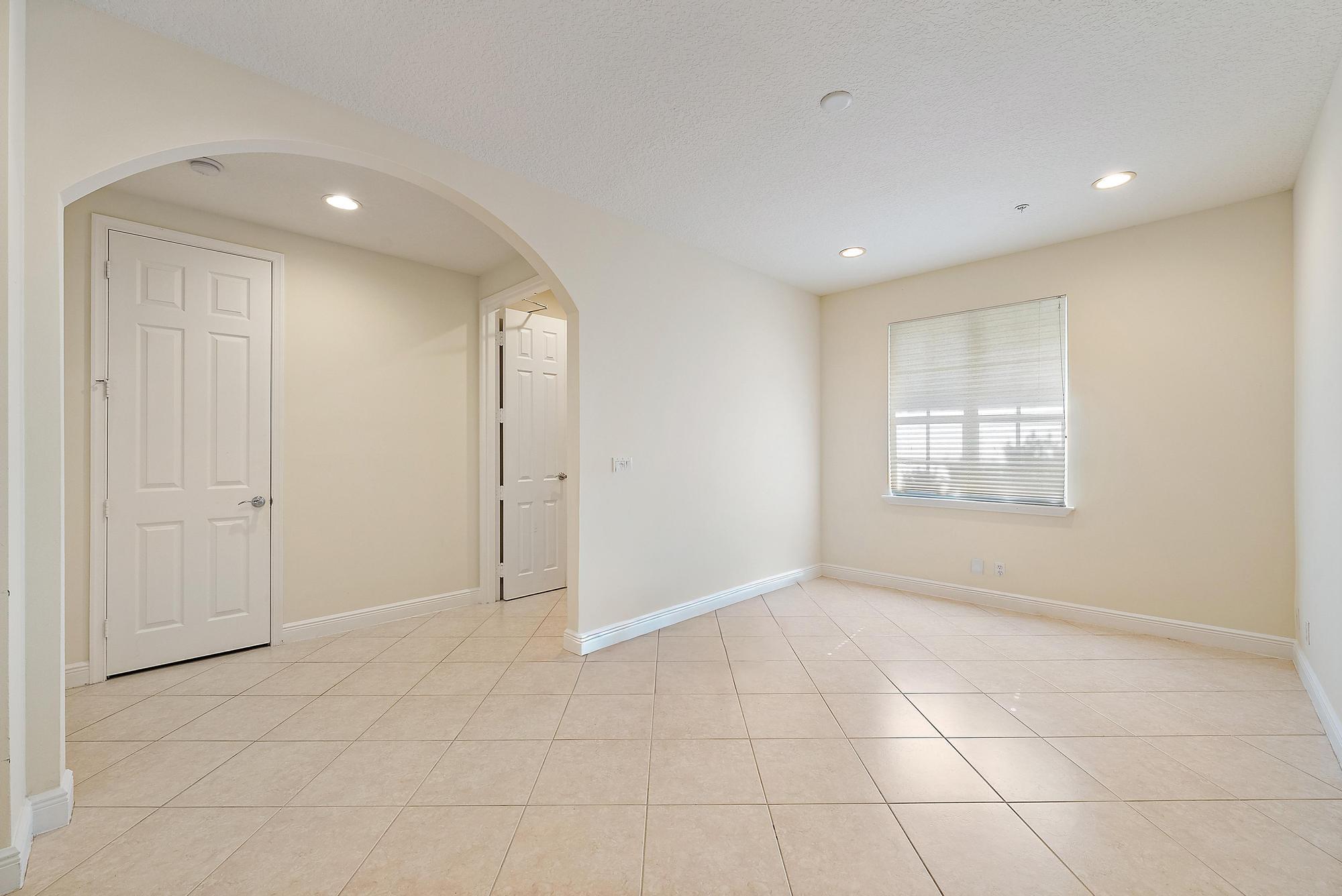 141 Morning Dew Circle Jupiter, FL 33458 - Photo 8 of 22 a view of an empty room