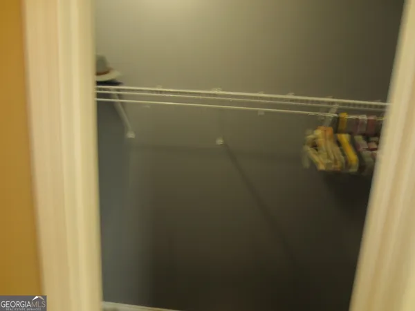 a view of room with gym equipment