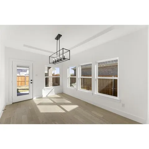 a black and white photo of a living room