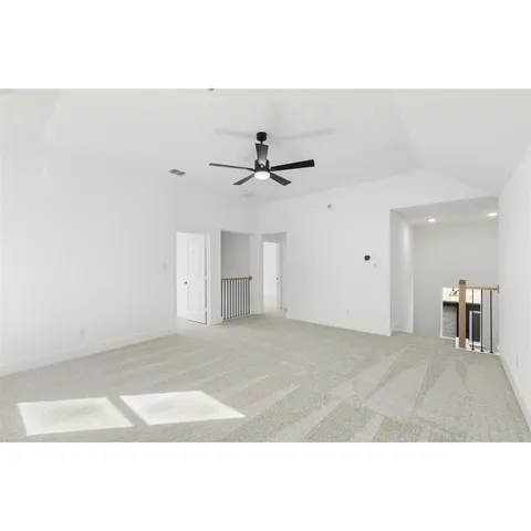 a view of livingroom with a ceiling fan