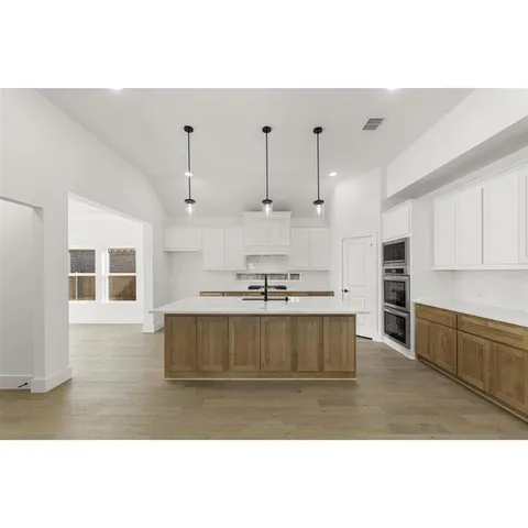 a view of kitchen and kitchen island