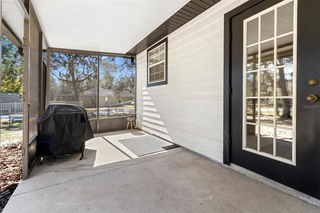 a view of livingroom with furniture and windows