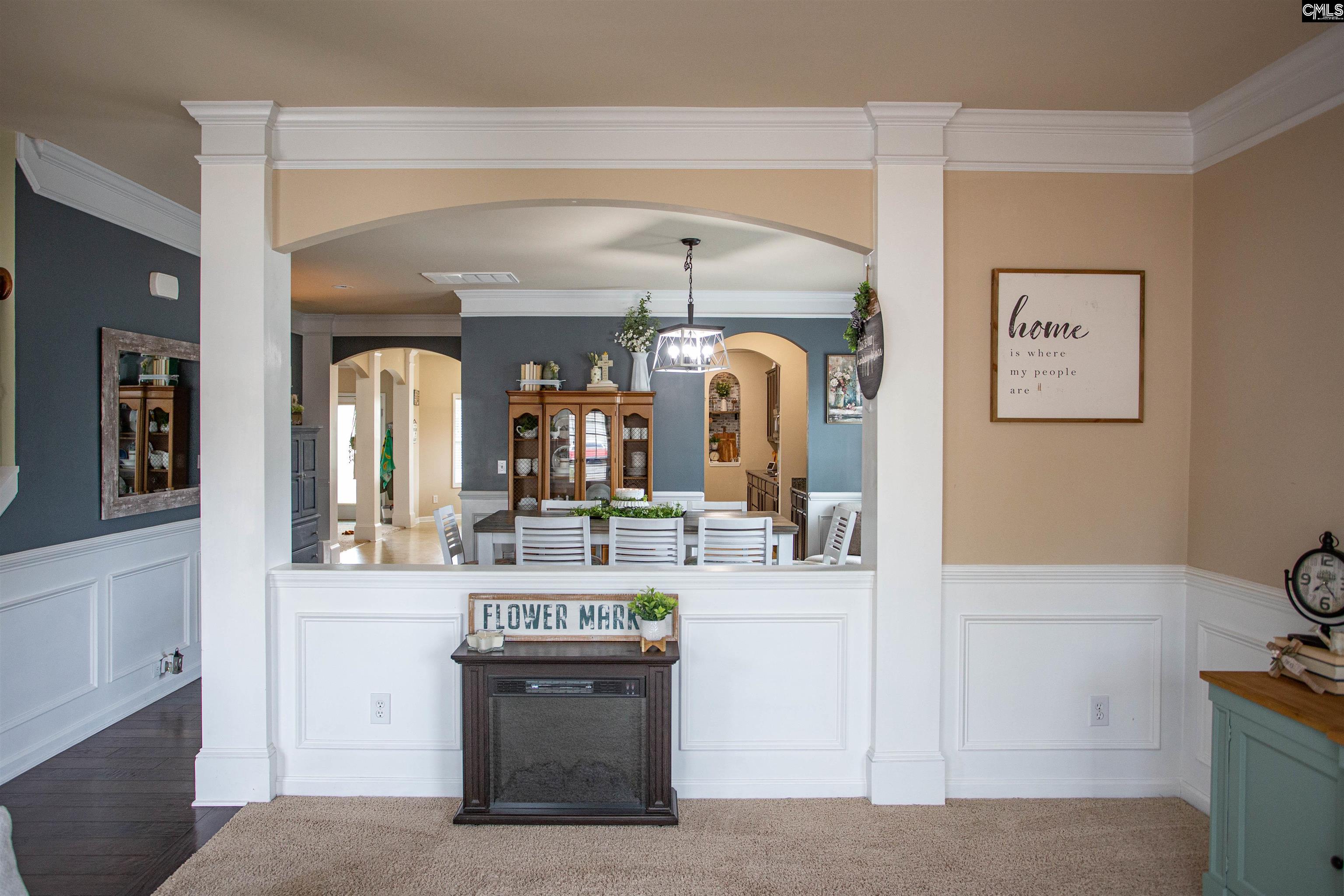 7 Templand Court Elgin, SC 29045 - Photo 6 of 47 a view of living room with granite countertop furniture and fireplace