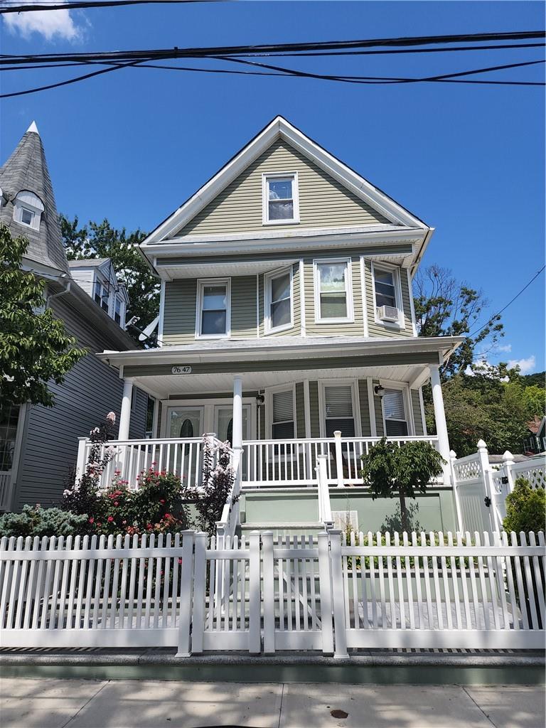 a front view of a house with a porch