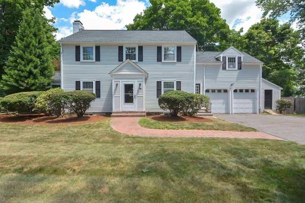 38 Hidden Road Andover, MA 01810 - Photo 23 of 31 a front view of a house with yard and green space