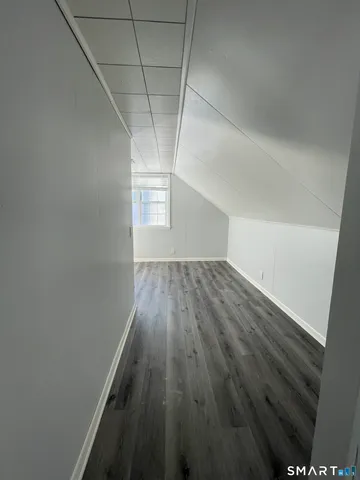 a view of small space with wooden floor