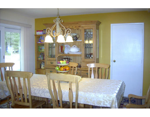10 Pamela Road Framingham, MA 01701 - Photo 4 of 9 a view of a dining room with furniture and a chandelier