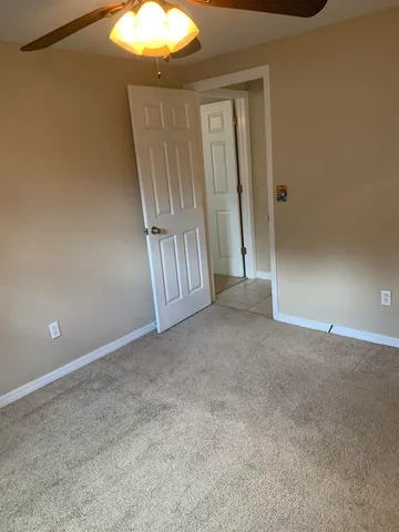 a bathroom with a sink a vanity and a mirror