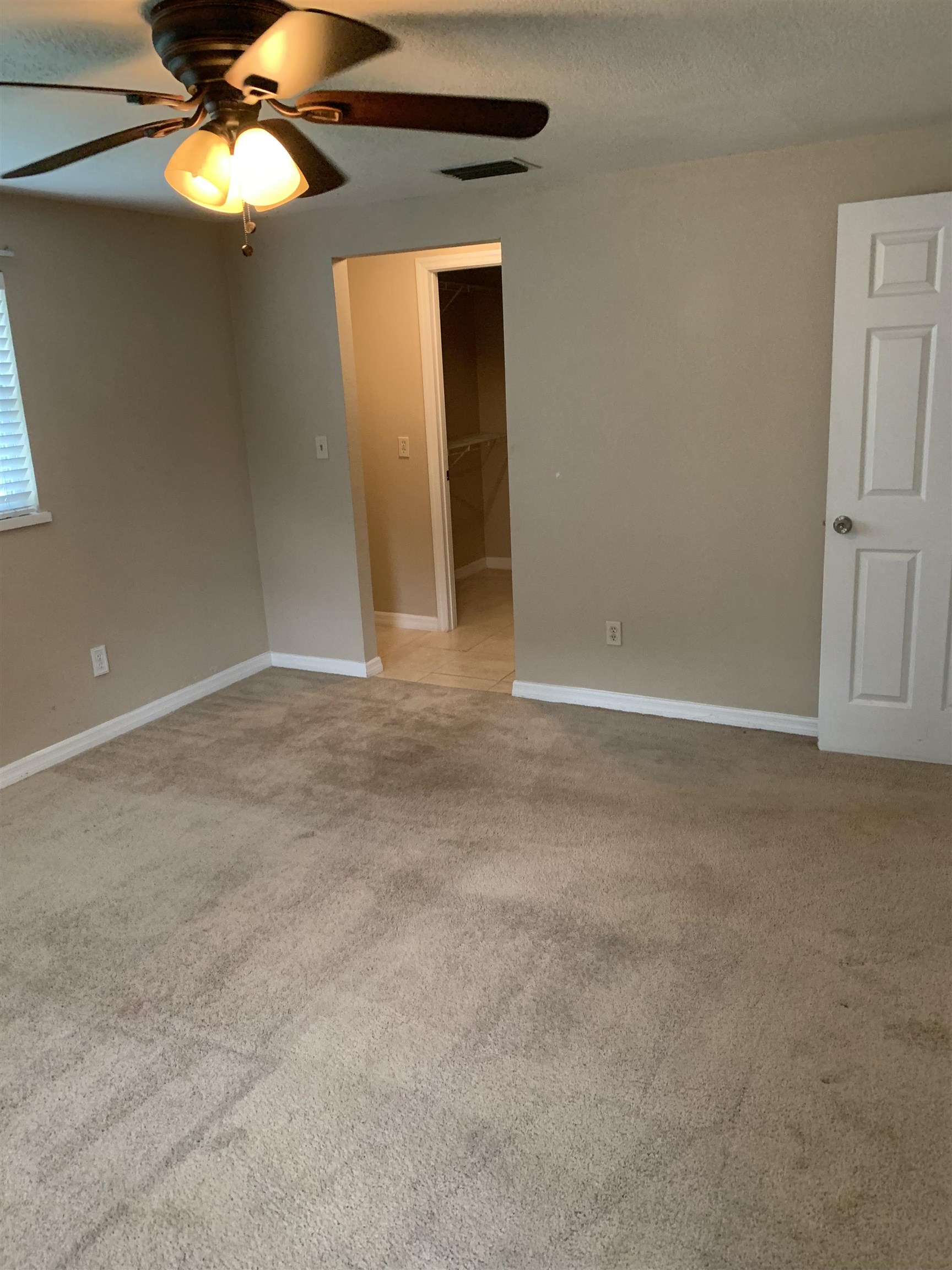 916 Palermo Road St. Augustine, FL 32086 - Photo 15 of 21 a view of an empty room with a window