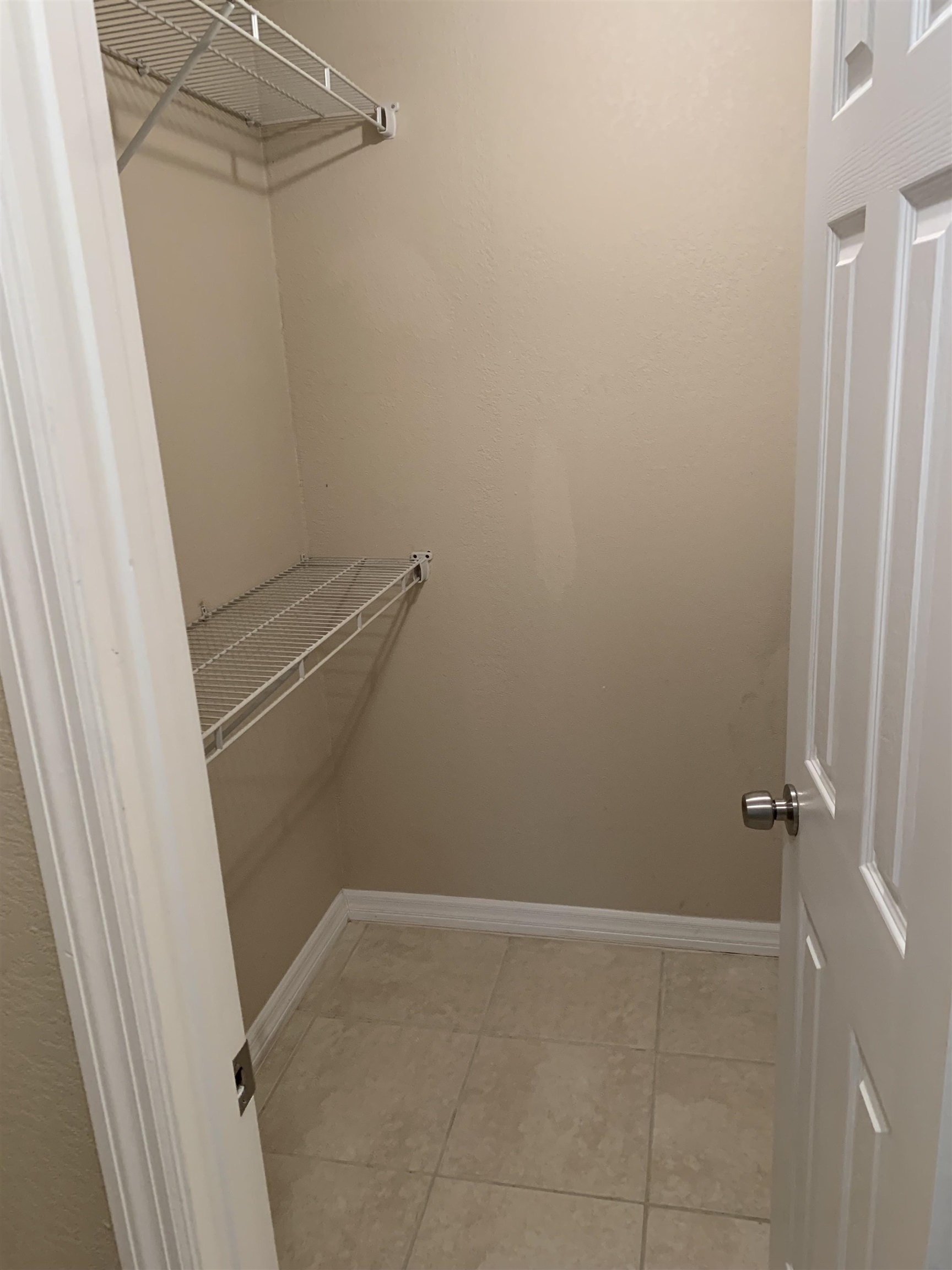 916 Palermo Road St. Augustine, FL 32086 - Photo 16 of 21 a view of a room with racks on the wall