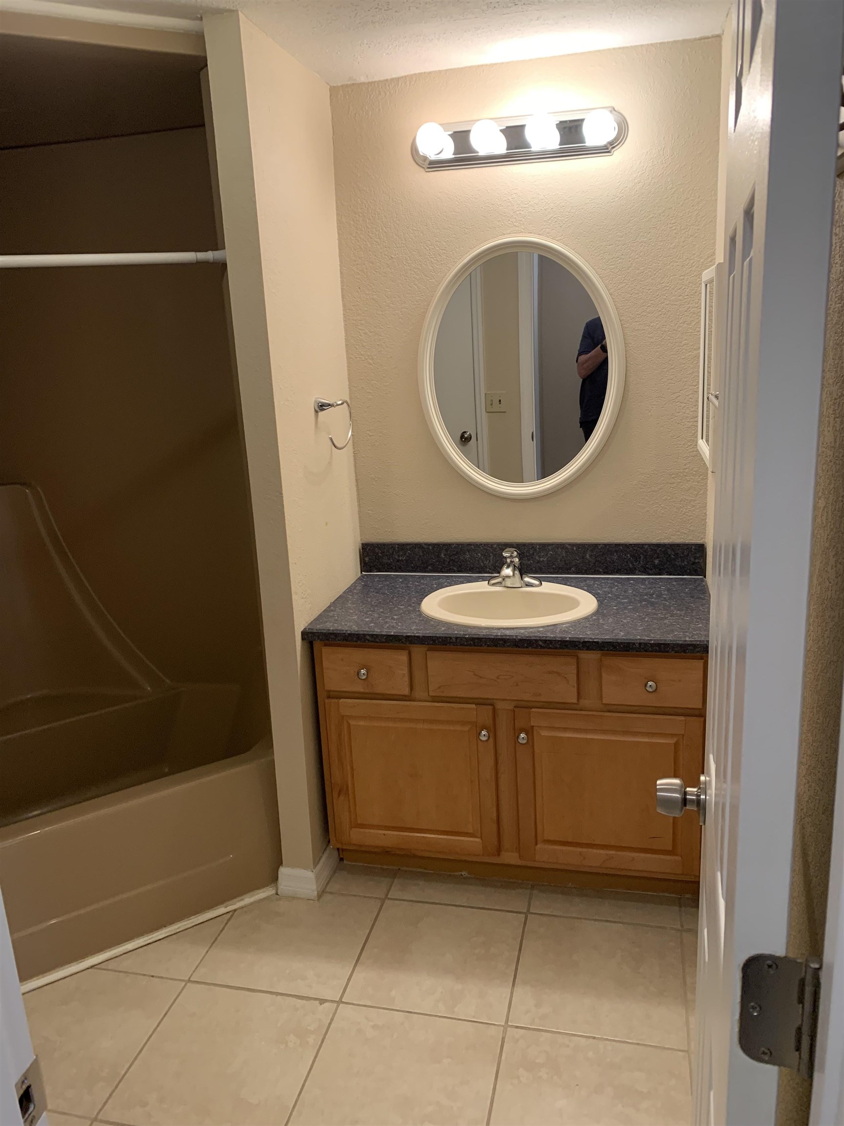 916 Palermo Road St. Augustine, FL 32086 - Photo 17 of 21 a bathroom with a granite countertop sink and a mirror