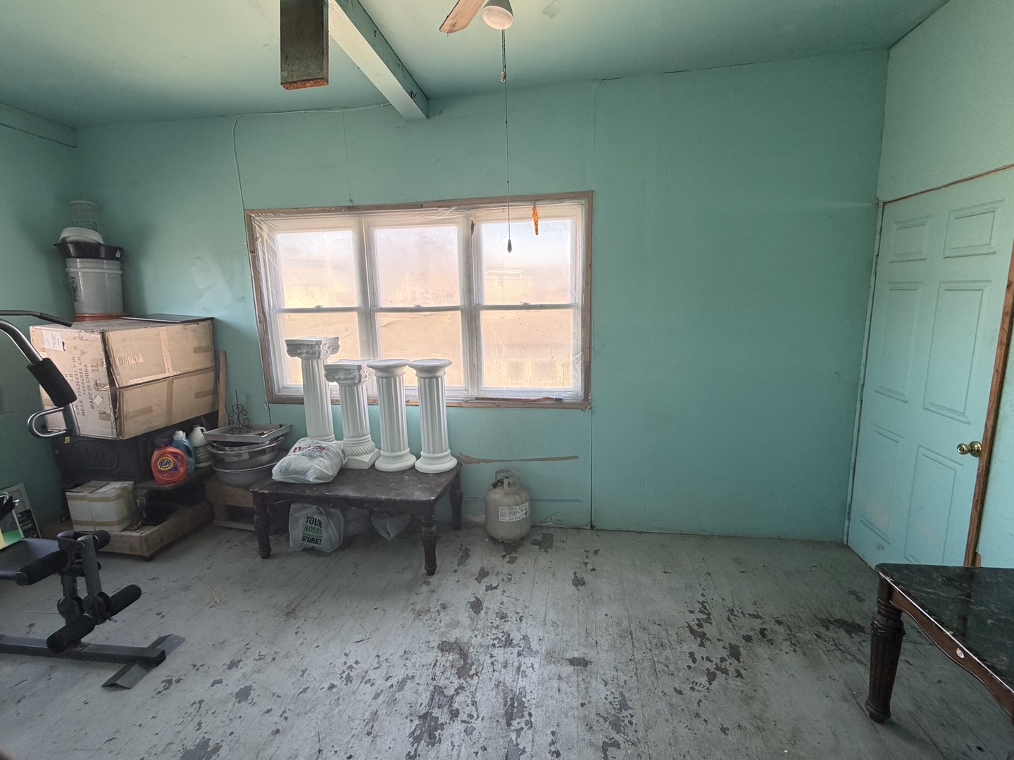 10045 South Ave M Chicago, IL 60617 - Photo 12 of 25 a living room with furniture and a window